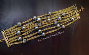 Bracelets - Grey Pearls and American Diamonds On Gold Finish Brass Chain